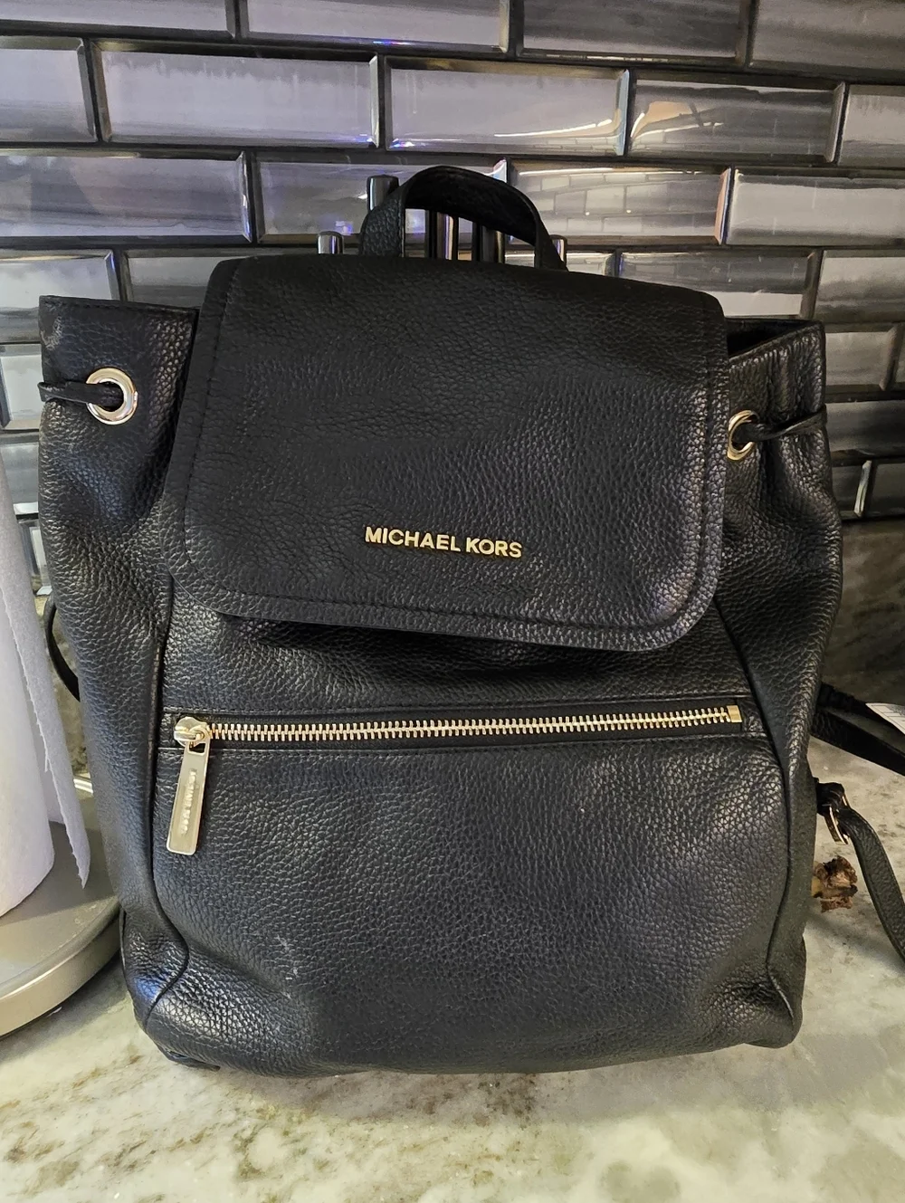 Michael Kors Black Pebbled Leather Flap Backpack with Gold Hardware